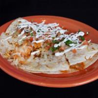 Flour Quesadilla · Grilled Monterey Jack cheese on a flour tortilla, comes with pico and sour cream. Add meat f...