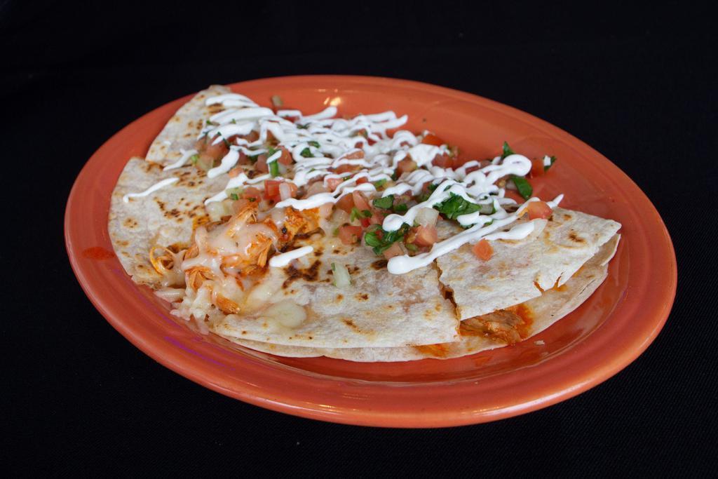 Flour Quesadilla · Grilled Monterey Jack cheese on a flour tortilla with pico and sour cream.