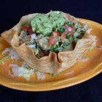 Meat Taco Salad · Meat, beans, lettuce mix, guacamole, sour cream and pico.