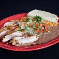 El Plato con Carne Combo Plate · Choice of meat and flour or corn tortilla. Includes beans, rice and pico
  
Silverware upon ...
