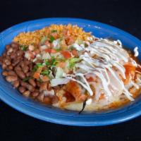 Chile Relleno Plato · Poblano pepper stuffed with cheese or chicken in an egg batter, served with our special rell...