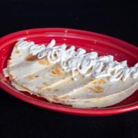 Kids Quesadilla · Corn quesadilla. Add meat for an additional charge.