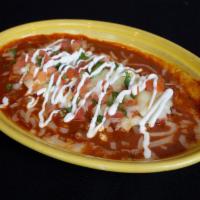 Enchilada · Choice of sauce, cheese, sour cream and pico.