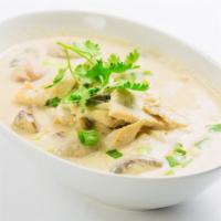 Tom Kha Soup · Creamy spicy and sour coconut soup. Spicy.