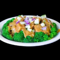 Pra Ram ( Rice not included ) · Broccoli sauteed with peanut sauce.
