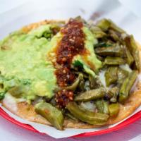 Veggie Mulas · Two-hand made Tortillas, cheese, napoles(cactus)n cheese, guacamole, onion, cilantro