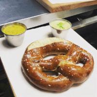 Pretzel · Served with Guinness Beer Cheese & Guinness Mustard.