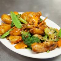 36. Empress Chicken · Deep-fried chicken breasts cooked with broccoli, carrots, snow peas, water chestnuts in a sw...