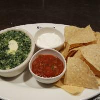 Spinach and Artichoke Dip · Fresh spinach, artichoke hearts, and onions, blended with Monterey Jack tossed in a Parmesan...