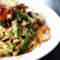 Club Salad · Crispy chicken, mixed greens, tomato, avocado, Smokehouse bacon, Monterey Jack and cheddar c...