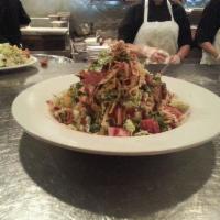 Rotisserie Chicken Salad · Rotisserie chicken, mixed greens, black beans, tomatoes, jicama, corn, carrots, Monterey Jac...