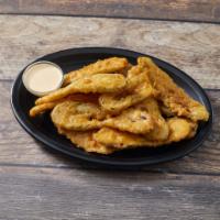 Crispy Fried Pickles · Beer battered dill pickles, fried crisp and served with McClure's bloody mary ranch.