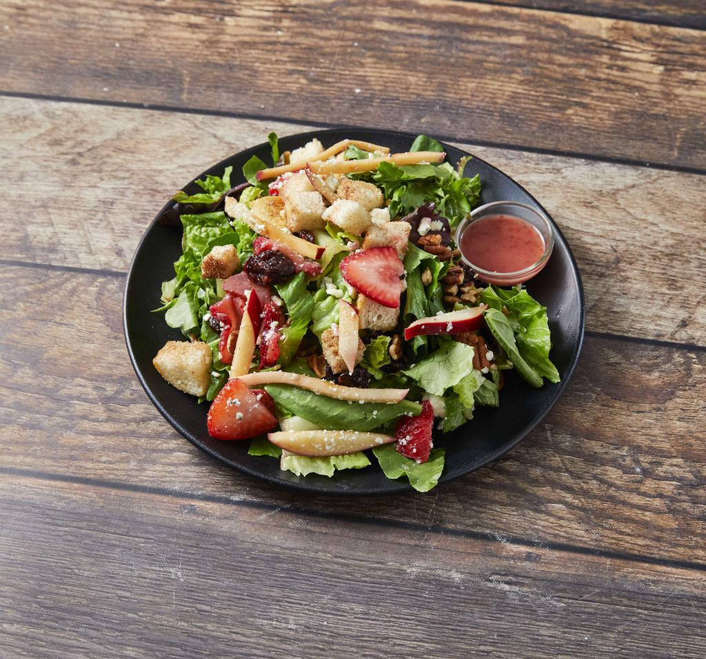 Twisted Rooster House Salad · Mixed greens, blue cheese, strawberries, fresh apple, Traverse City dried cherries, cinnamon toast croutons, roasted pecans, and cherry maple vinaigrette.
