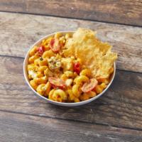 Buffalo Mac and Cheese · Cavatappi, red hot cheese blend, smoked chicken, tomatoes, topped with bleu cheese and green...
