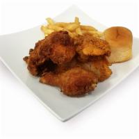 Chicken Dinner · Four pieces of famous juicy golden fried chicken. Served with French fries, dinner roll and ...