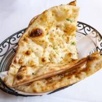 Garlic Naan · White flour bread stuffed with chopped garlic, cilantro and butter. (No Gluten-Free)