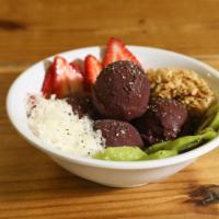 Açai Bowl · Strawberry, Kiwi, coconut, chia seeds & granola.