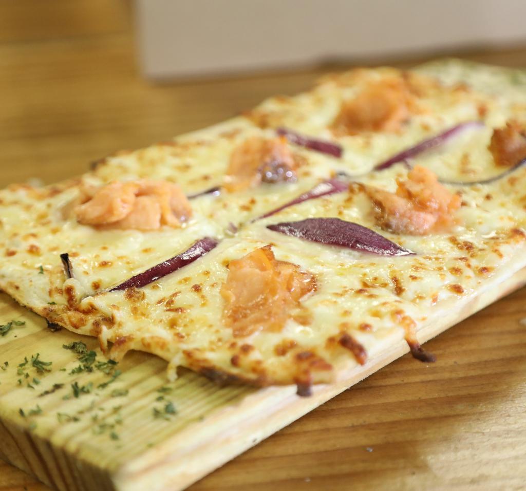 Salmon Pizza · Smoked salmon, red onion, cream cheese & mozzarella