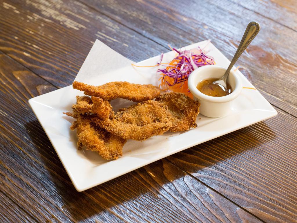 Coconut Prawns · White prawn dipped in coconut batter and deep-fried to a golden brown.