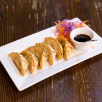 Pot Stickers · Served with plum sauce.