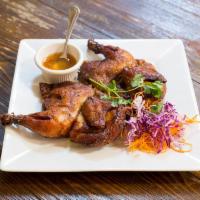 BBQ Chicken · Served with sticky rice and sweet and sour sauce.