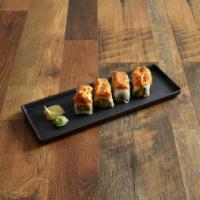Bikini Roll · Crab meat, avocado and wrapped with spicy tuna.