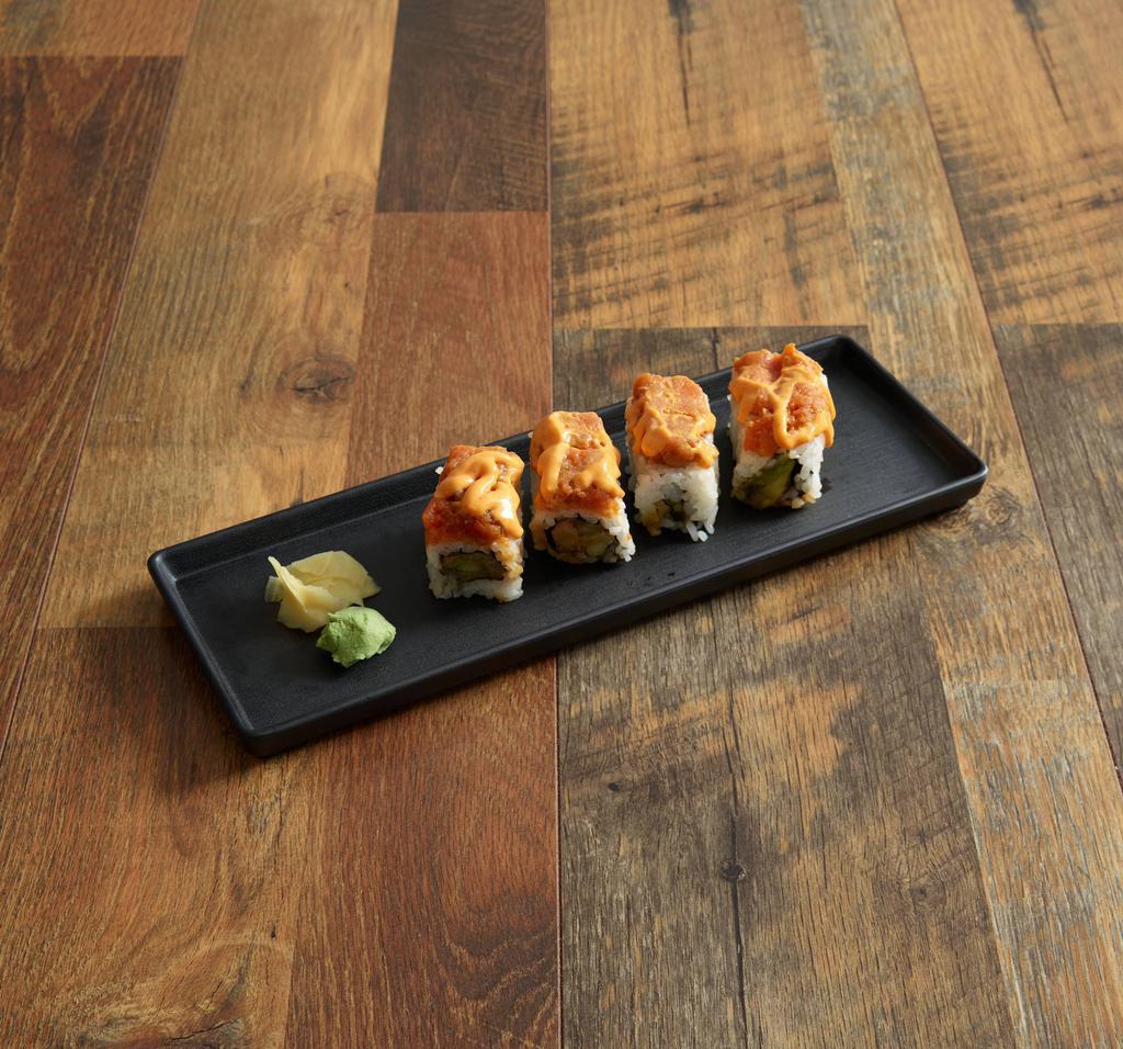 Bikini Roll · Crab meat, avocado and wrapped with spicy tuna.
