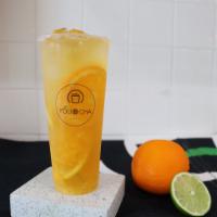 Booming Orange · Fresh orange with a hint of lemon and lime paired with our in-house specialty tea
