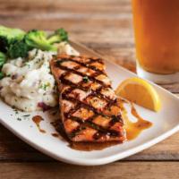 IPA Salmon · Grilled Atlantic Salmon, brushed with our sweet IPA glaze served with red skin mashed potato...