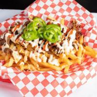 Korean BBQ Fries · Shoestring fries served with chicken or beef. Topped with our special sauce, ranch dressing,...