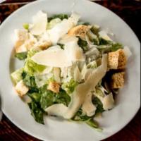 Caesar Salad · A classic with shaved parmesan & croutons. Dressing served on the side.