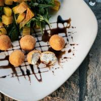 Crispy Goat Cheese Balls · Golden beets with lemon zested arugula, balsamic maple glaze