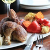 Fired Roasted Rotisserie Chicken · 1/2 chicken, fire roasted rustic vegetables & fingerling potatoes, and homemade maple bourbo...
