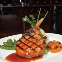 Frenched Bone In Pork Chop · smoked pork prime rib, apricot ginger glaze, asparagus, whipped jewel yams, apricot chutney