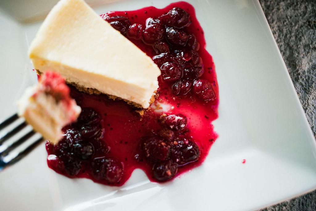 Vanilla Cheesecake · graham cracker crust, cranberry compote