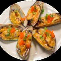 Baked Green Mussels · 6 baked green mussels with spicy mayo and sweet glaze topped with masago and scallions.