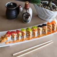 Stardust Roll · Shrimp tempura, crab meat, spicy sauce, topped with spicy tuna mix, avocado and various flav...