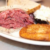 Corned Beef Full Sandwich Deluxe · Served with your choice of side.