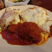 DiSalvo's Tour of Italy · Chicken parmigiana, one meatball, one sausage and baked ziti topped with mozzarella baked un...