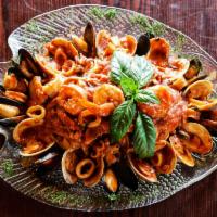 Zuppa di Pesce · Sauteed fresh clams, shrimp, calamari, scungilli and mussels in a red or white sauce.
