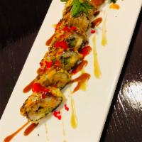 S15. Sakura Roll · Spicy salmon, eel, avocado and cream cheese deep fried with sauce & fish eggs on top.