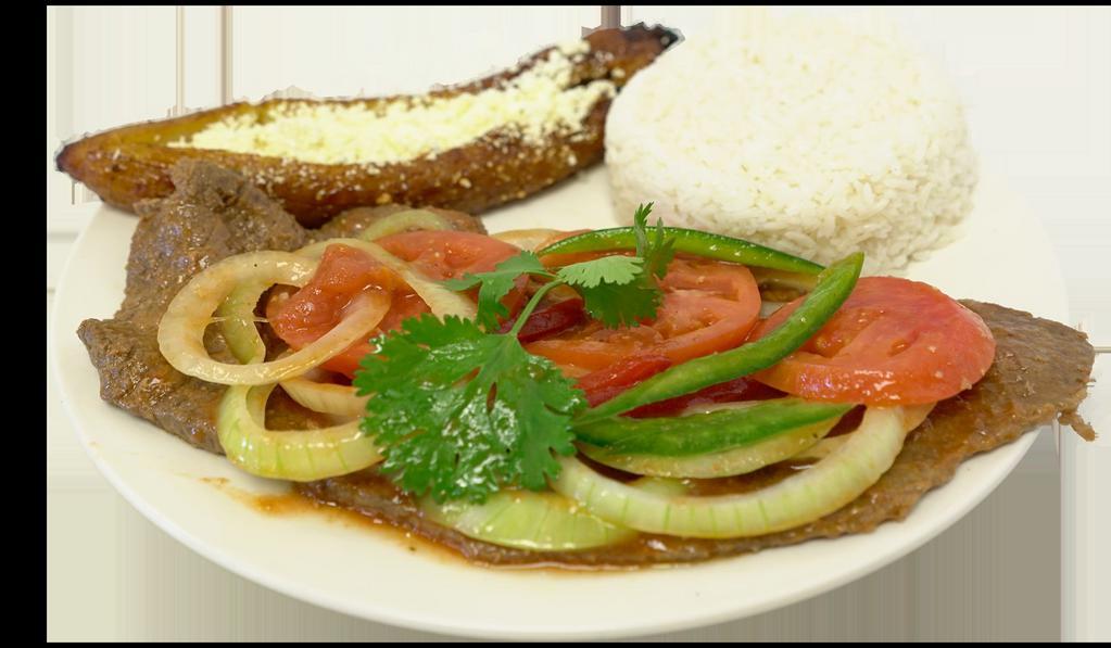 Bistec Entomatado · Beef steak with red sauce, tomatoes and onions.