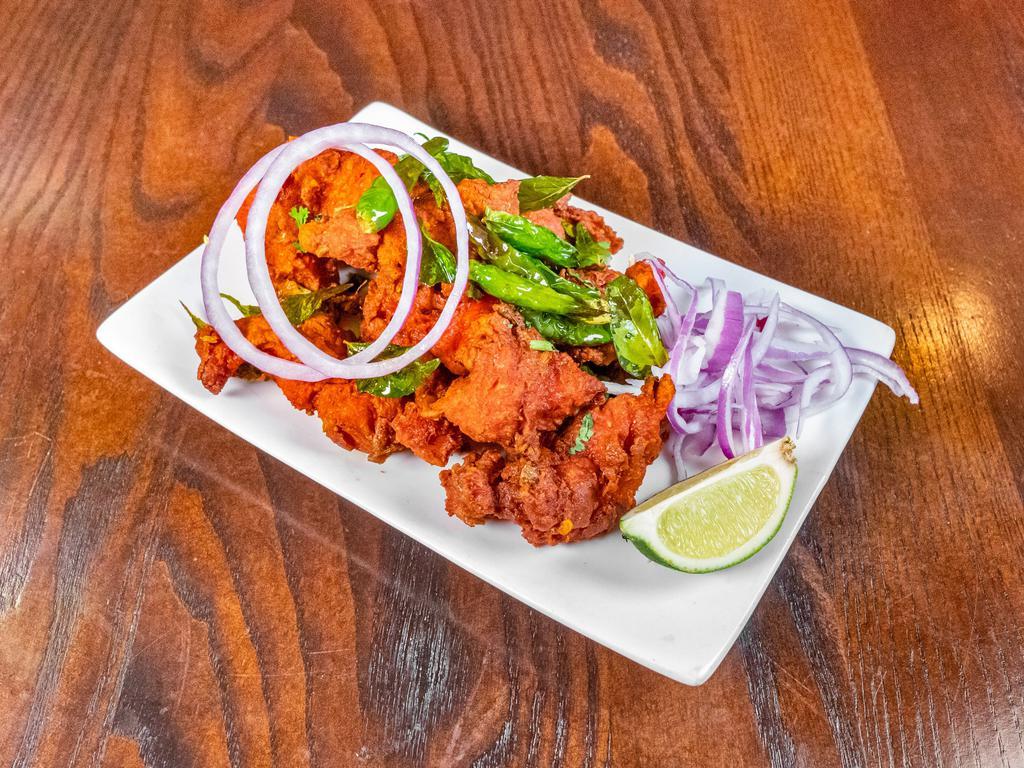 Chennai Chicken Pakoda · Cut chicken pieces battered in chick peas flour and deep fried with herbs and spices.