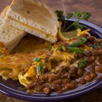 Chili Cheese Omelette · Smothered with chili and topped with cheese.