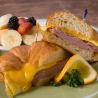 Croissant Sandwich  · Egg, ham and cheese.