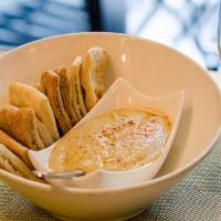 Hummus · Served with Pita Bread. Add a Plate of Fresh Crudités.