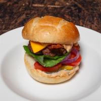 Bacon Burger · 3 slices of smoked applewood bacon, club sauce, lettuce, onion, pickles, tomatoes, and chedd...