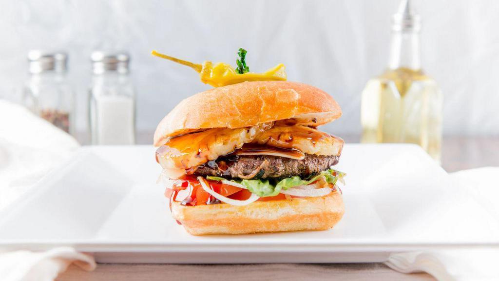 Pineapple Teriyaki Burger · 2 slices of sweet grilled pineapple, Swiss cheese, and our own sweet pineapple teriyaki sauce, lettuce, tomato, and onion.
