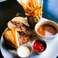 Prime Rib French Dip · French onion au jus, USDA shaved prime rib, bolillo, herb garlic butter, jalapeno ranch, and...