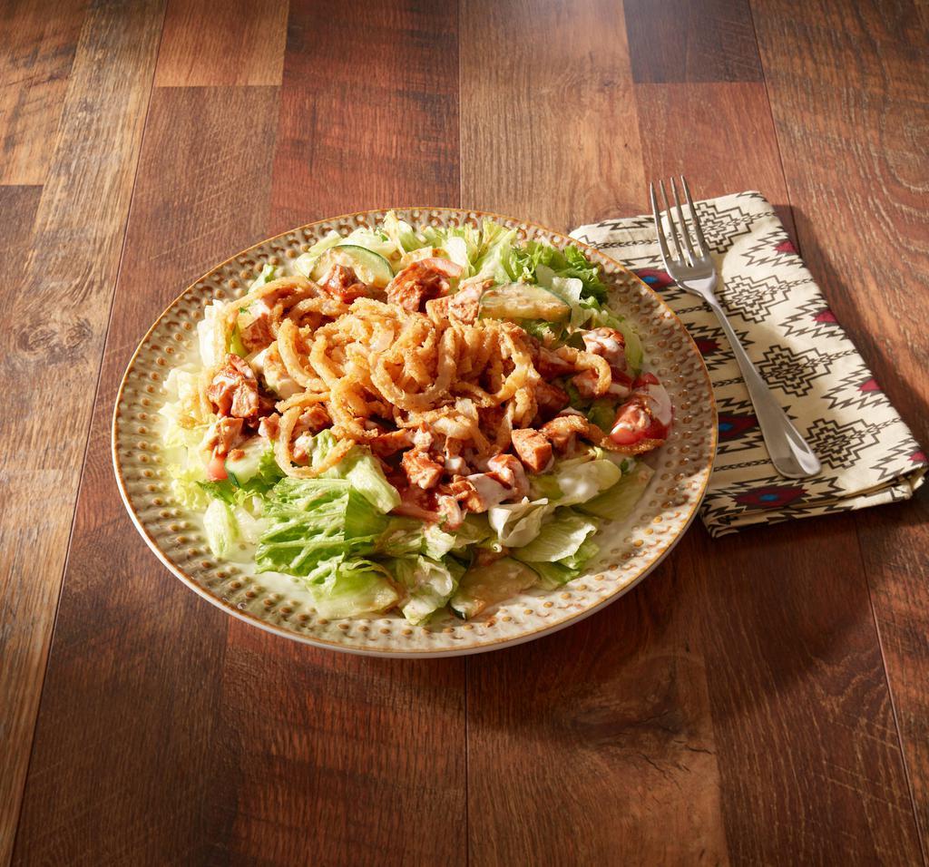 Tom's BBQ Salad · Bed of lettuce, tomatoes, cucumbers, topped with ranch dressing, our famous mild BBQ sauce and onion strings with your choice of meat.
